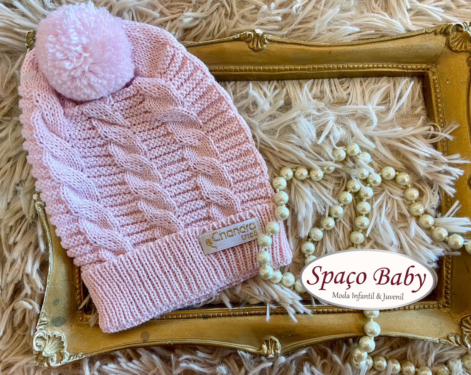 Touca em tricô rosa bebê