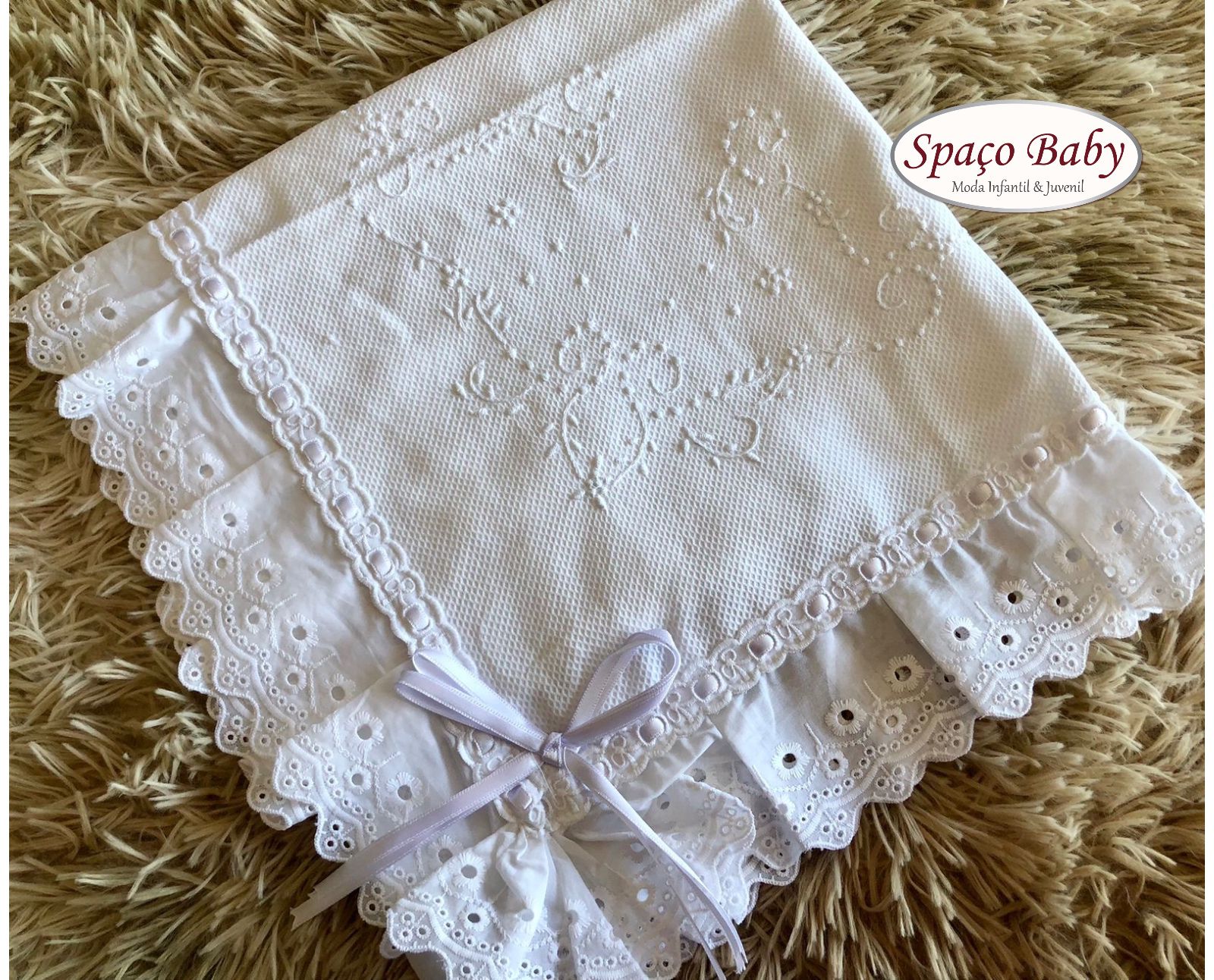 Manta bordada a mão