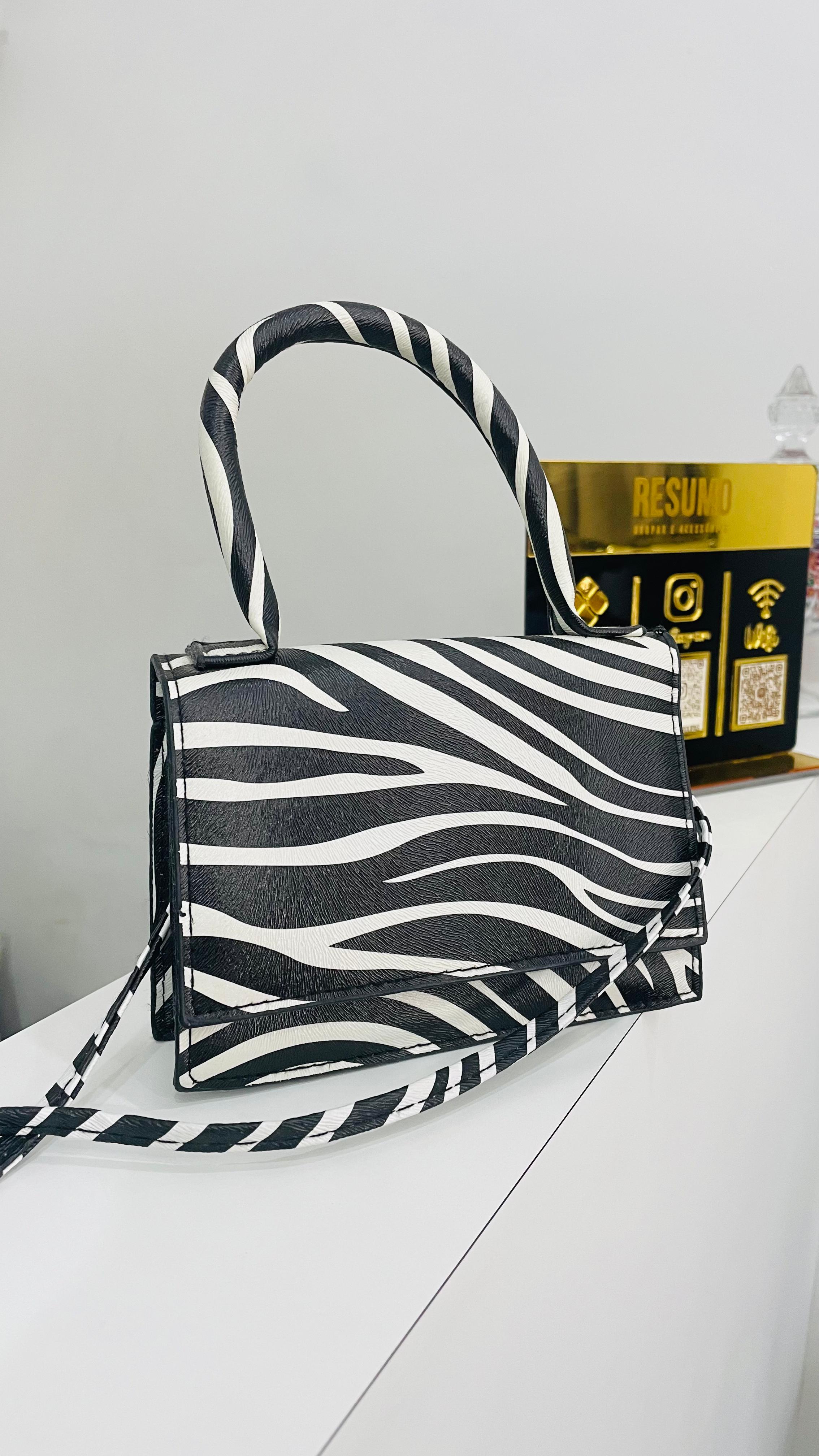 Bolsa mini animal print sintética