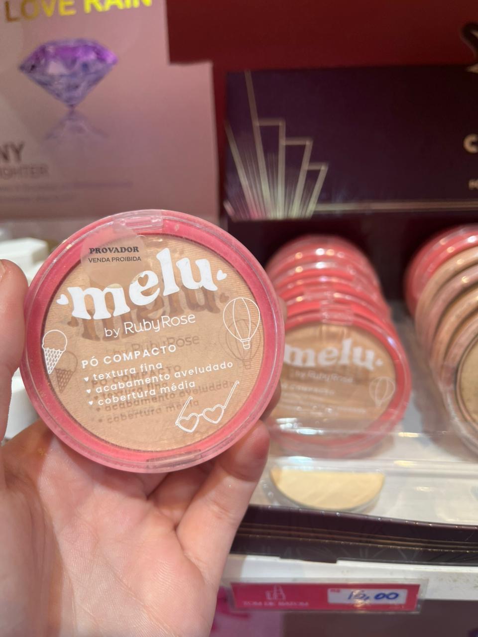 Pó compacto Melu