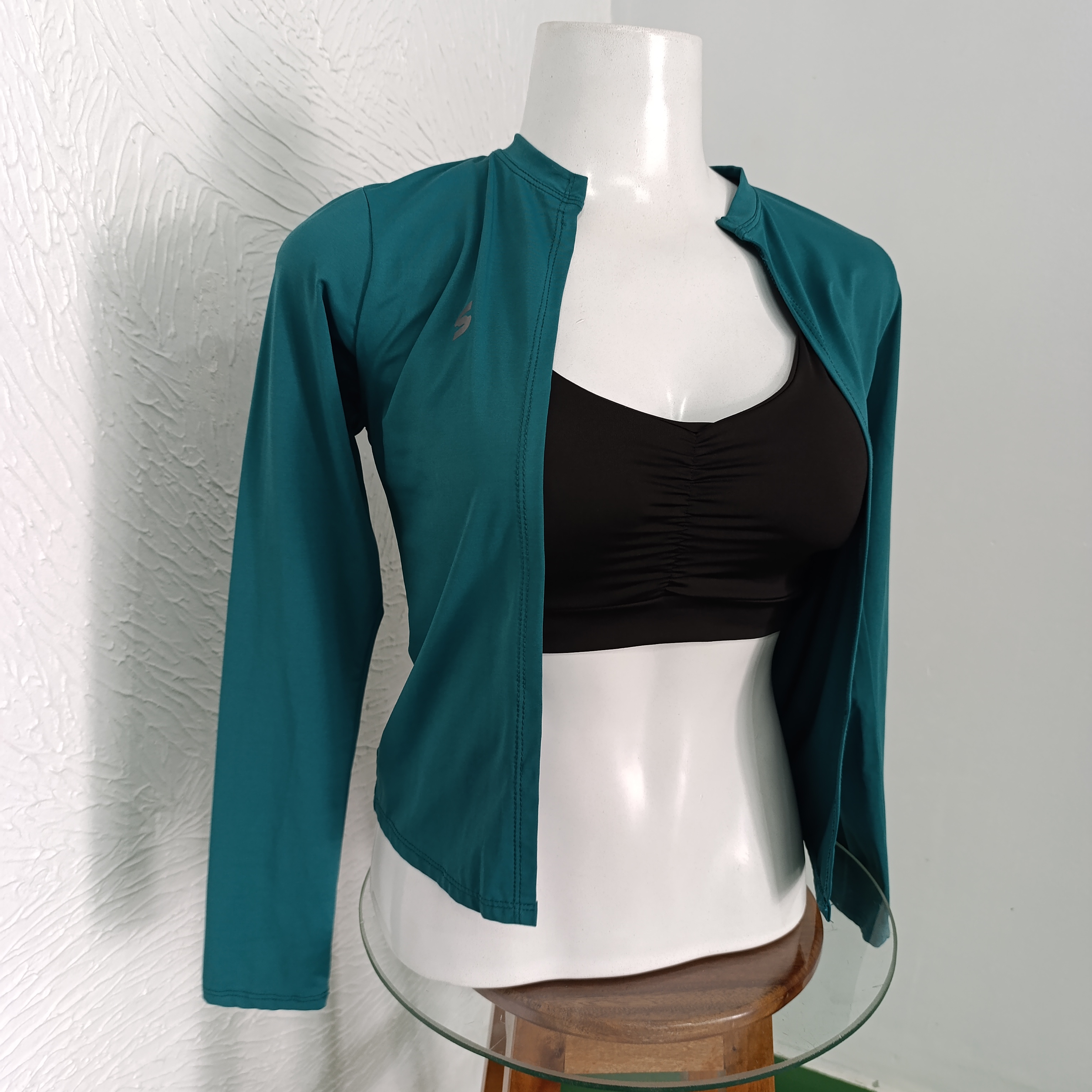 Casaquinho P UV sem zíper. Cor verde petróleo