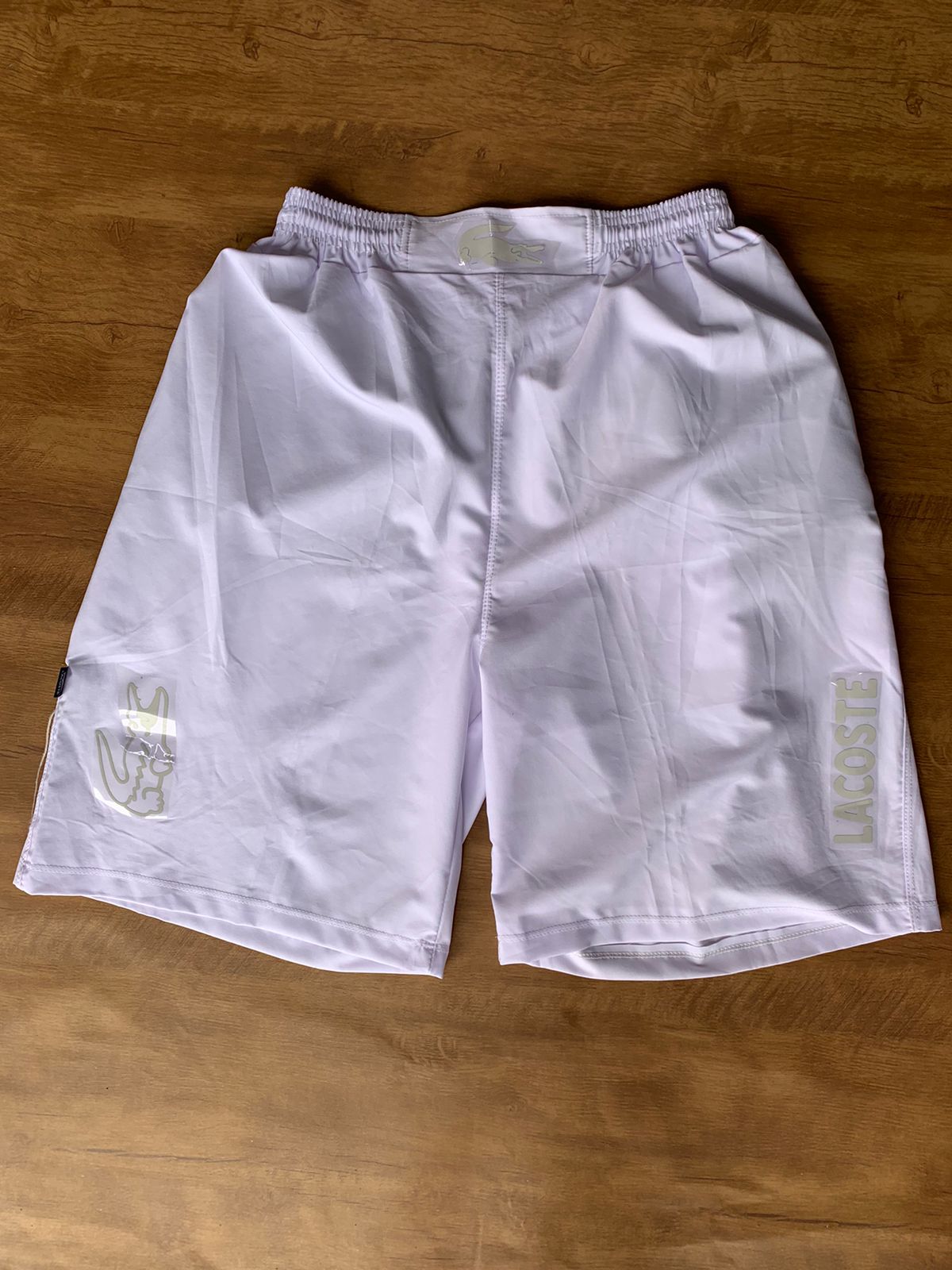 BERMUDA IMPERMEAVEL Branco Nike ou Lacoste