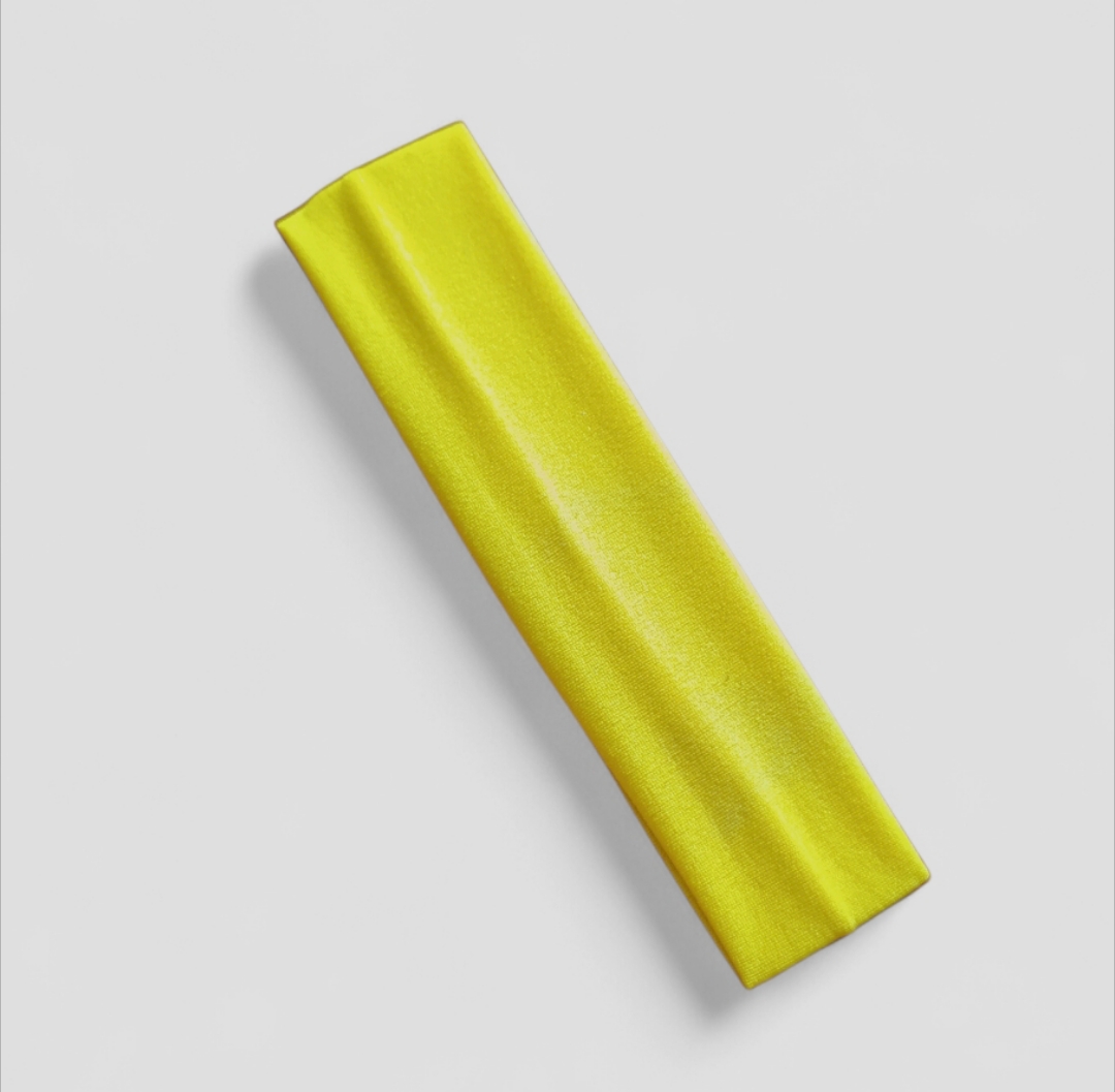 Faixa para cabelos. Cor. Amarela