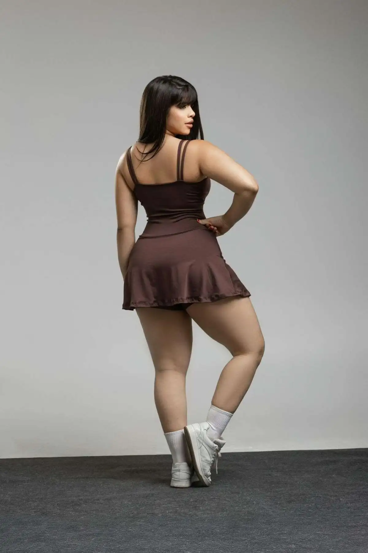 Macaquito M saia. Cores PRETO e MARROM